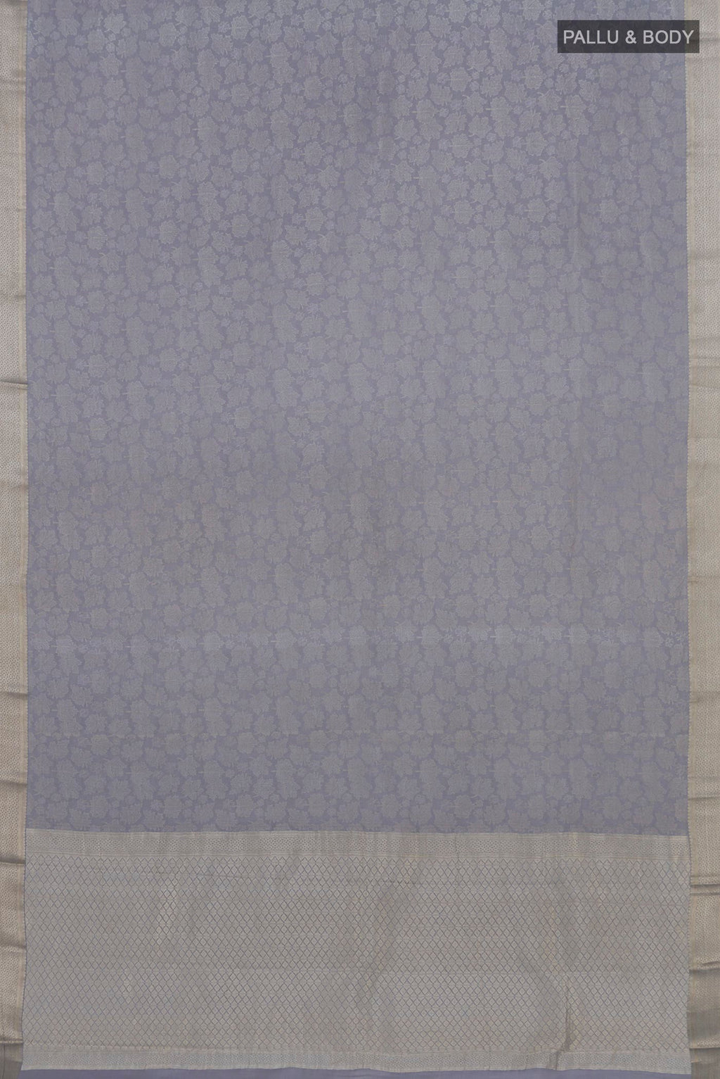 Flat view of Grey Mysore Crepe Saree with Zari Brocade on the body and Zari Border. 