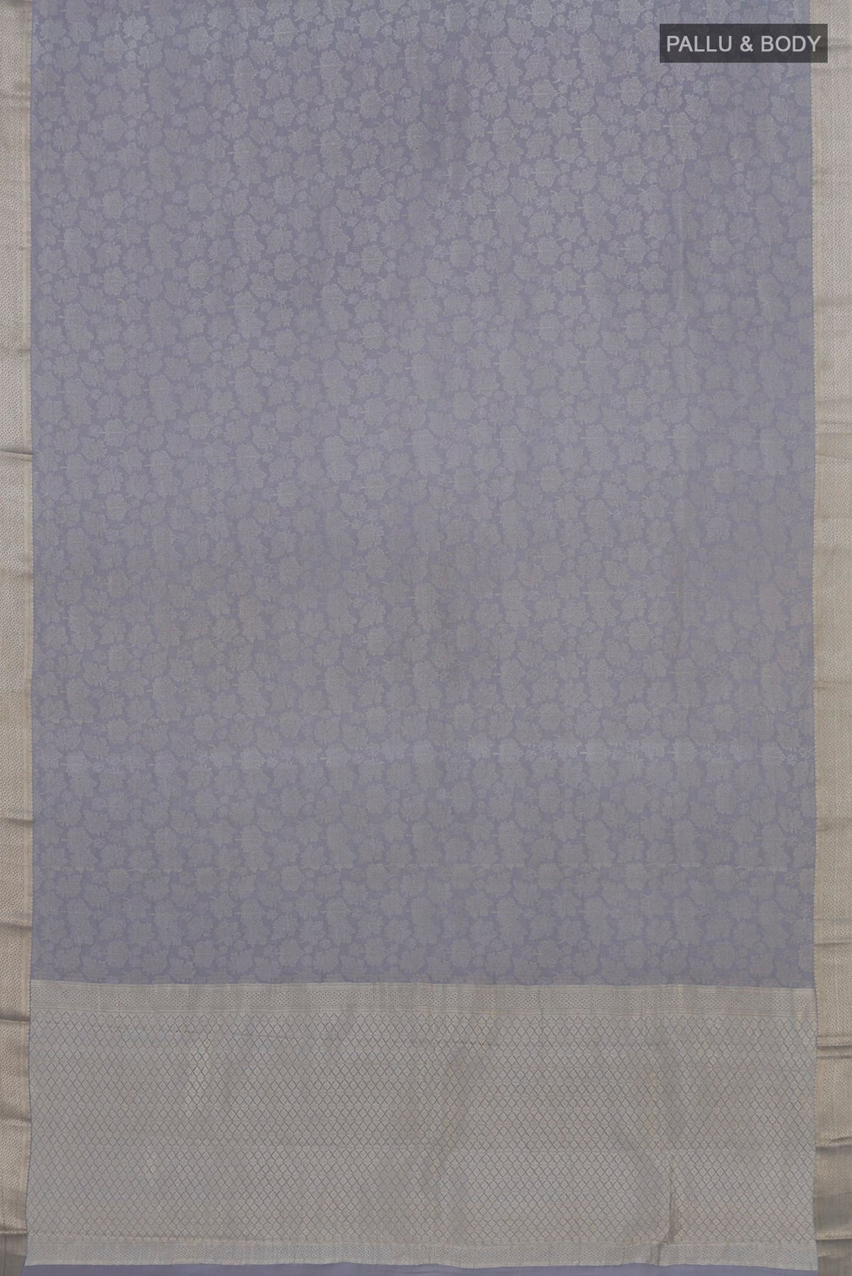 Flat view of Grey Mysore Crepe Saree with Zari Brocade on the body and Zari Border. 