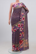Lavender Tussar Silk Saree with Zari Butta on the body and Fancy Border.  displayed on a mannequin