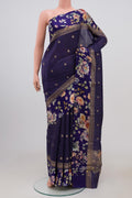 Blue Tussar Silk Saree with Zari Butta on the body and Fancy Border.  displayed on a mannequin