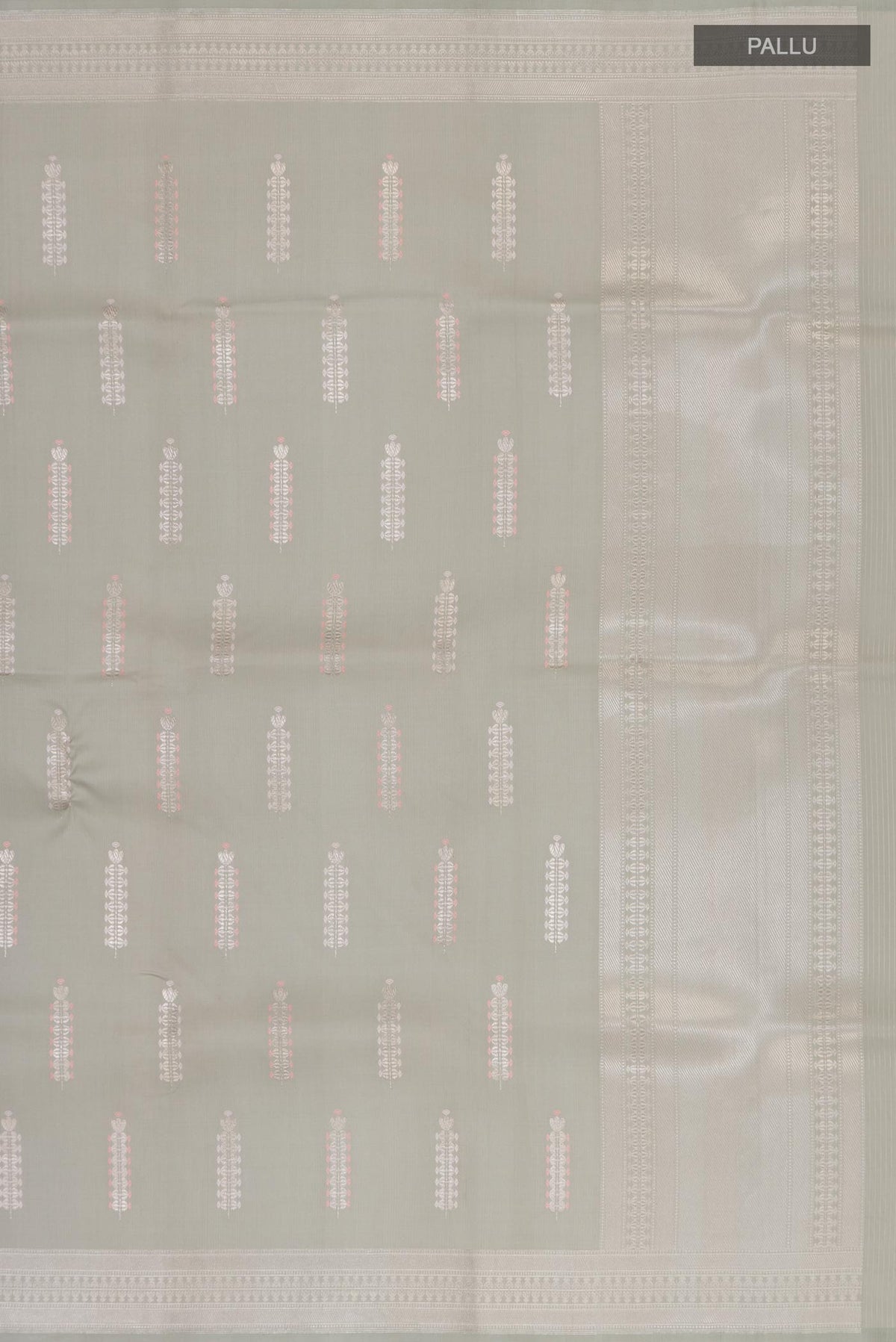 Close up image of the pallu of Grey Banarasi Silk Saree with Zari Butta on the body and Zari Border. 