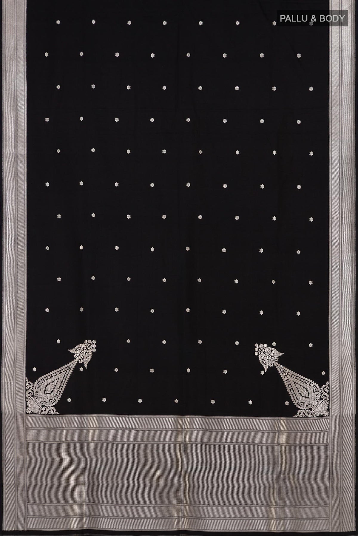 Flat view of Black Banarasi Silk Saree with Zari Butta on the body and Zari Border. 