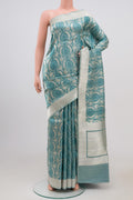 Grey Banarasi Silk Saree with Zari Brocade on the body and Zari Border.  displayed on a mannequin