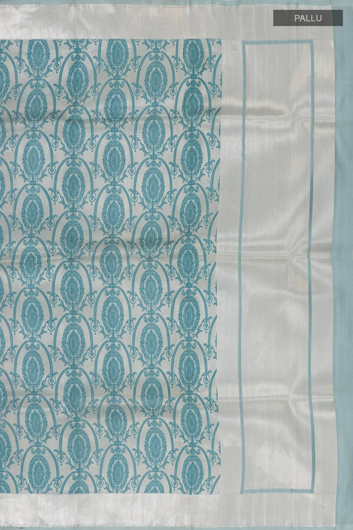 Close up image of the pallu of Grey Banarasi Silk Saree with Zari Brocade on the body and Zari Border. 