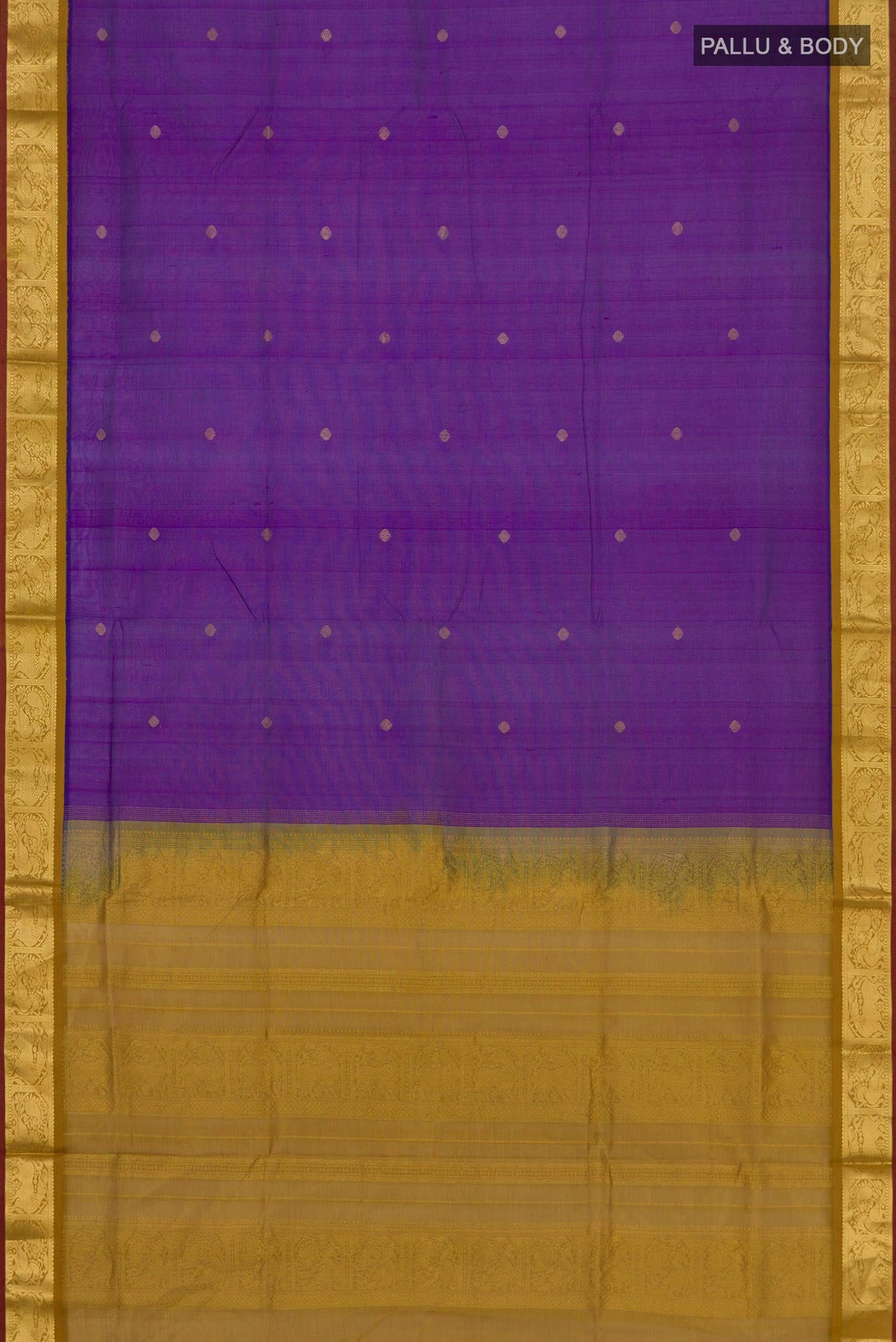 Flat view of Purple Silk Cotton Saree with Zari Butta on the body and Zari Border. 