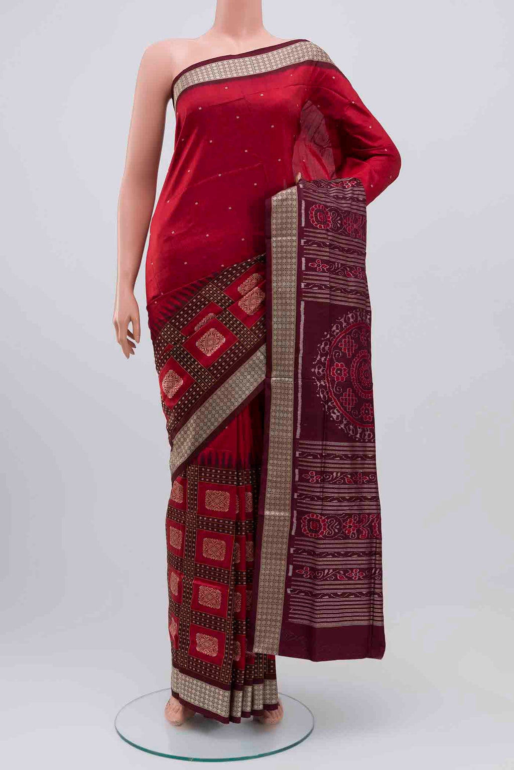 Maroon Orissa Silk Saree with Thread Butta on the body and Thread Border displayed on a mannequin