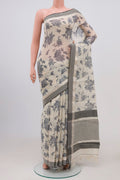 Beige Tussar Saree with Floral Print on the body and Zari Border.  displayed on a mannequin