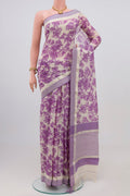 Off White Printed Cotton Saree with Printed design on the body and Thread Border.  displayed on a mannequin