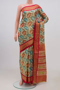 Off White Pochampally Silk Saree with Ikat Print on the body and Zari Border.  displayed on a mannequin