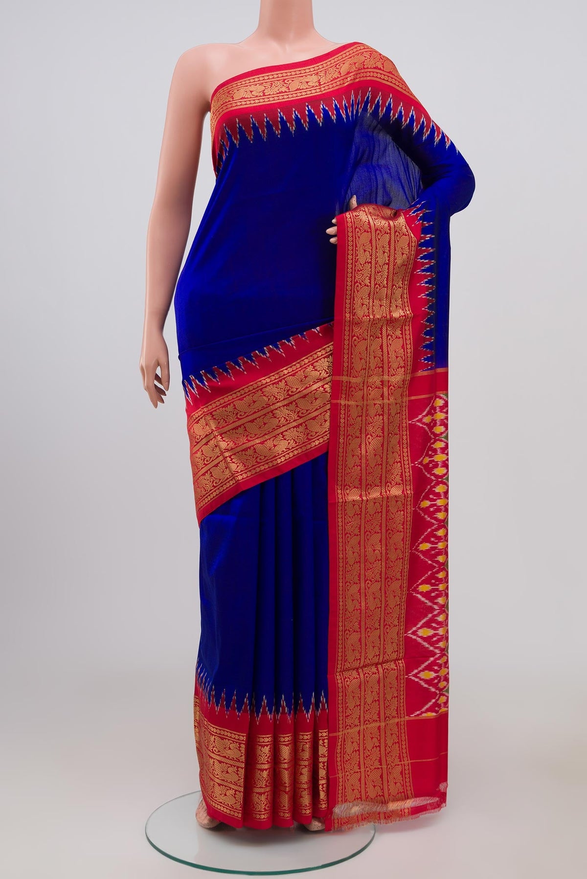 Blue Pochampally Silk Saree with Plain Body and Zari Border.  displayed on a mannequin