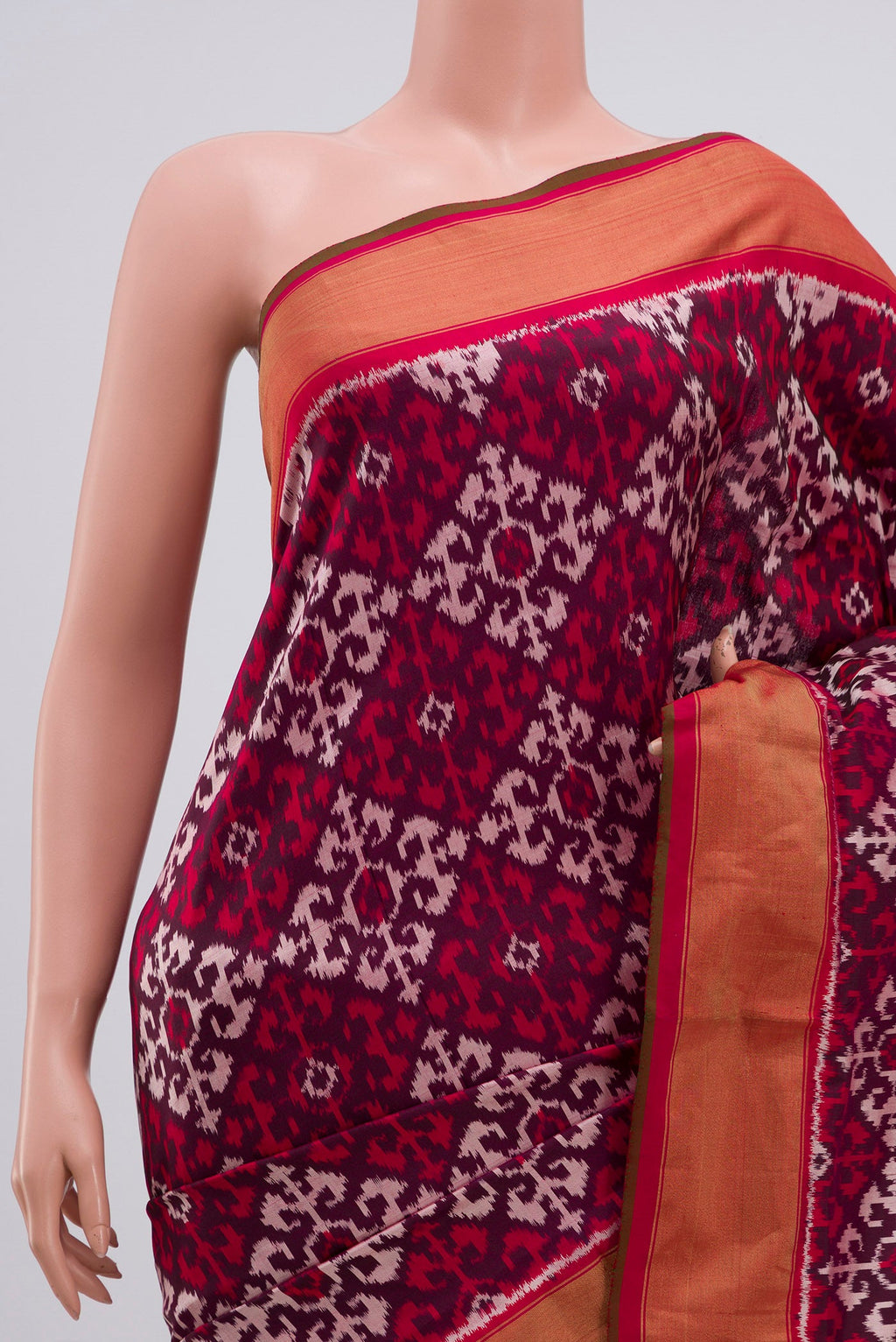 Border image of Brown Pochampally Silk Saree with Ikat Print on the body and Zari Border. 
