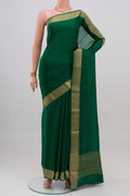 Green Mysore Chiffon Saree with Plain Body and Zari Border.  displayed on a mannequin