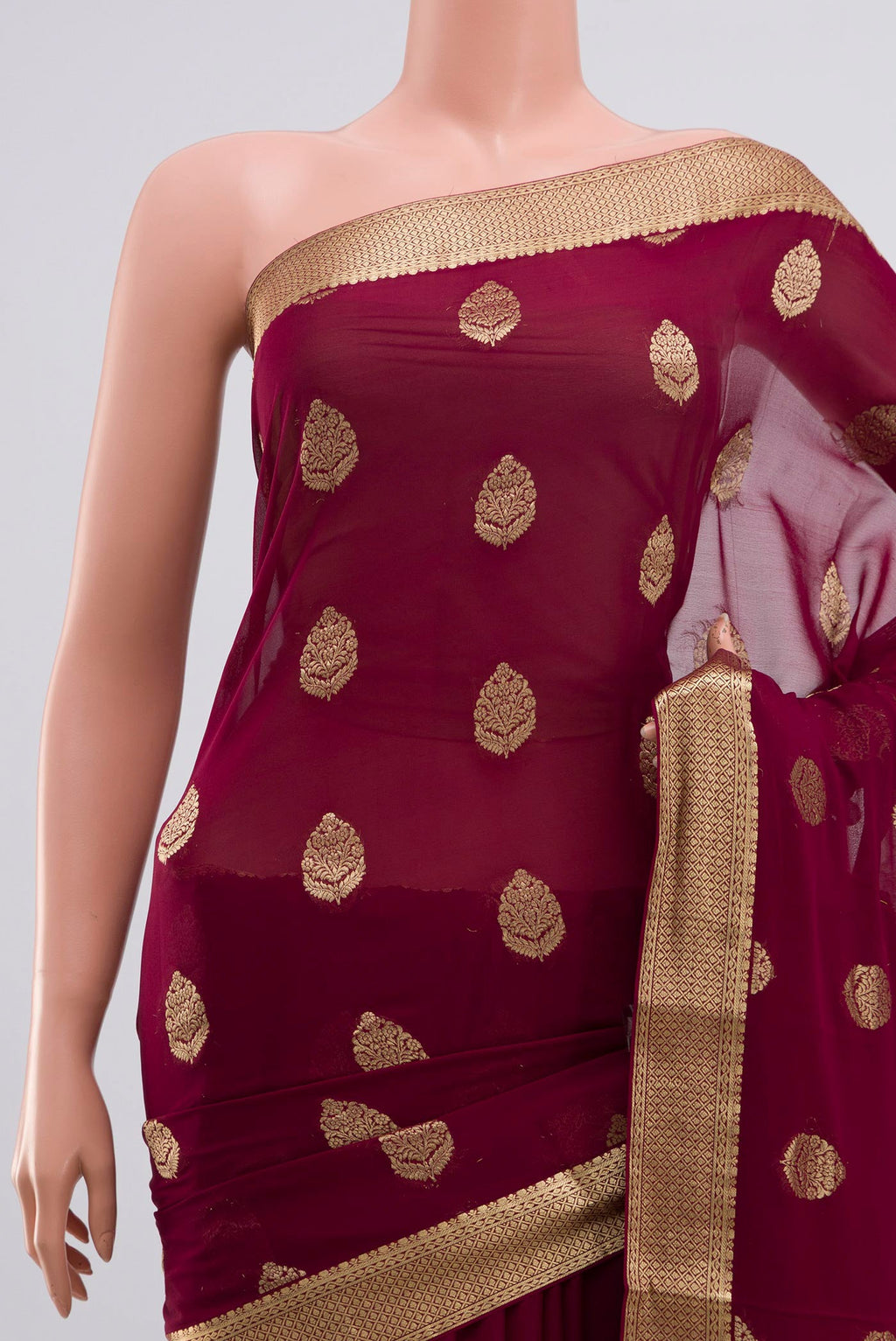 Border image of Purple Georgette Saree with Zari Butta on the body and Zari Border. 