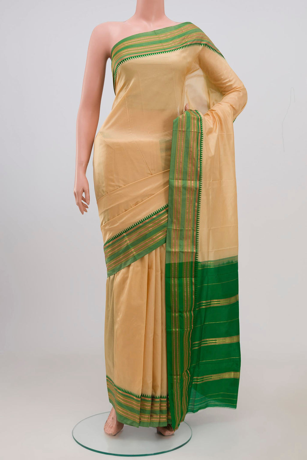 Sandal Narayanpet Silk Saree with Plain Body and Thin Zari Line.  displayed on a mannequin