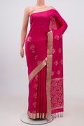 Pink Soft Silk Saree with Zari Butta on the body and Zari Border.  displayed on a mannequin