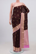 Brown Crepe Saree with Zari Butta on the body and Zari Border.  displayed on a mannequin