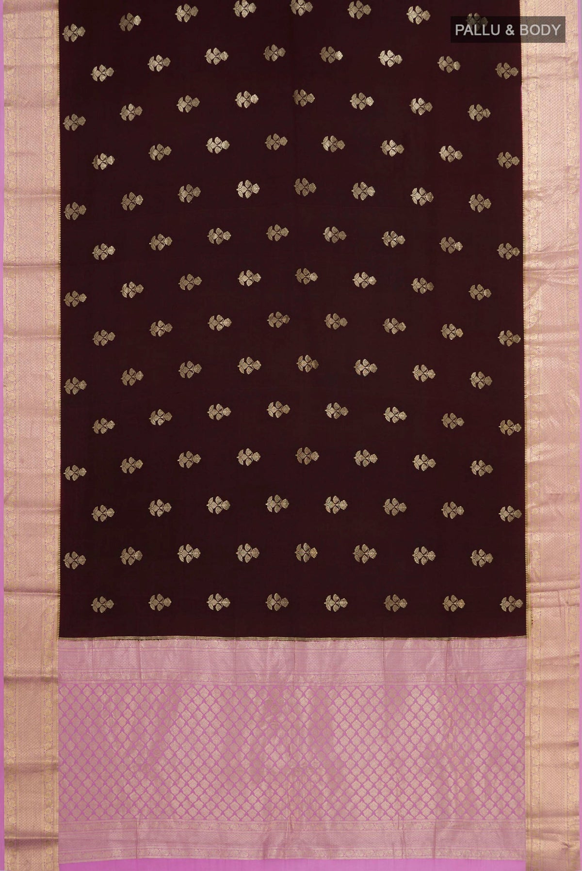 Flat view of Brown Crepe Saree with Zari Butta on the body and Zari Border. 
