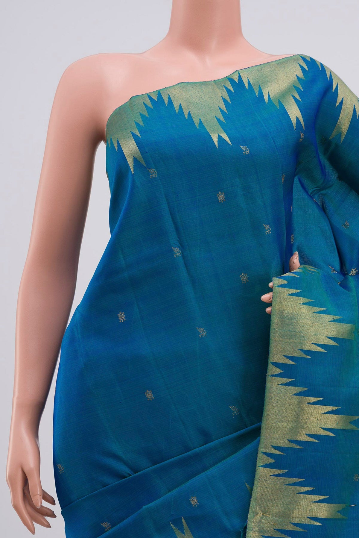 Border image of Pure Silk Pure Zari Peacock Blue Kanchipuram Saree with Zari Butta on the body and Temple Border. 