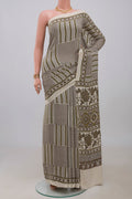Cream Blended Satin Silk Saree with Ajrakh Print on the body and Printed Border.  displayed on a mannequin