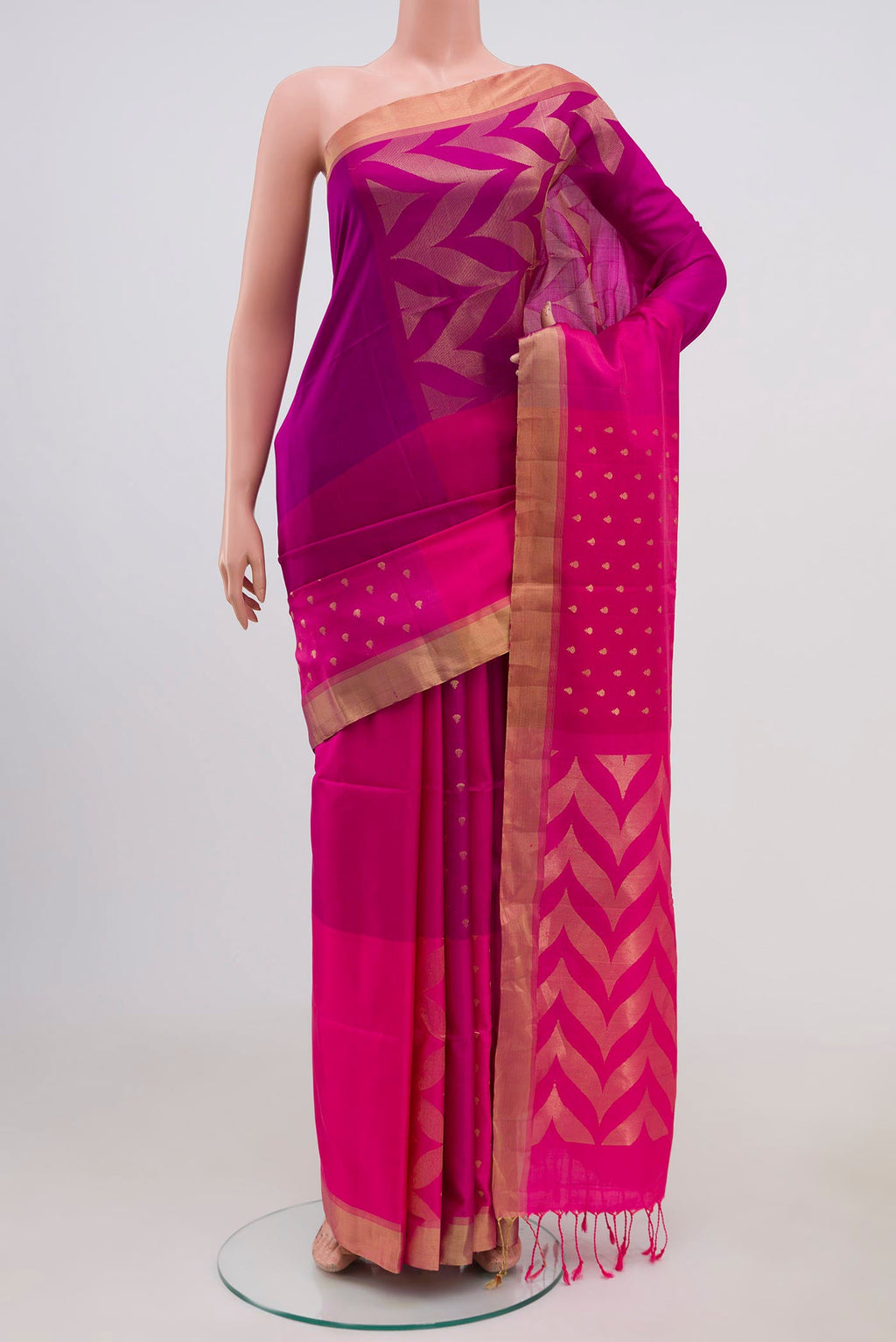 Pink Soft Silk Saree with Checked design on the body and Zari Border.  displayed on a mannequin