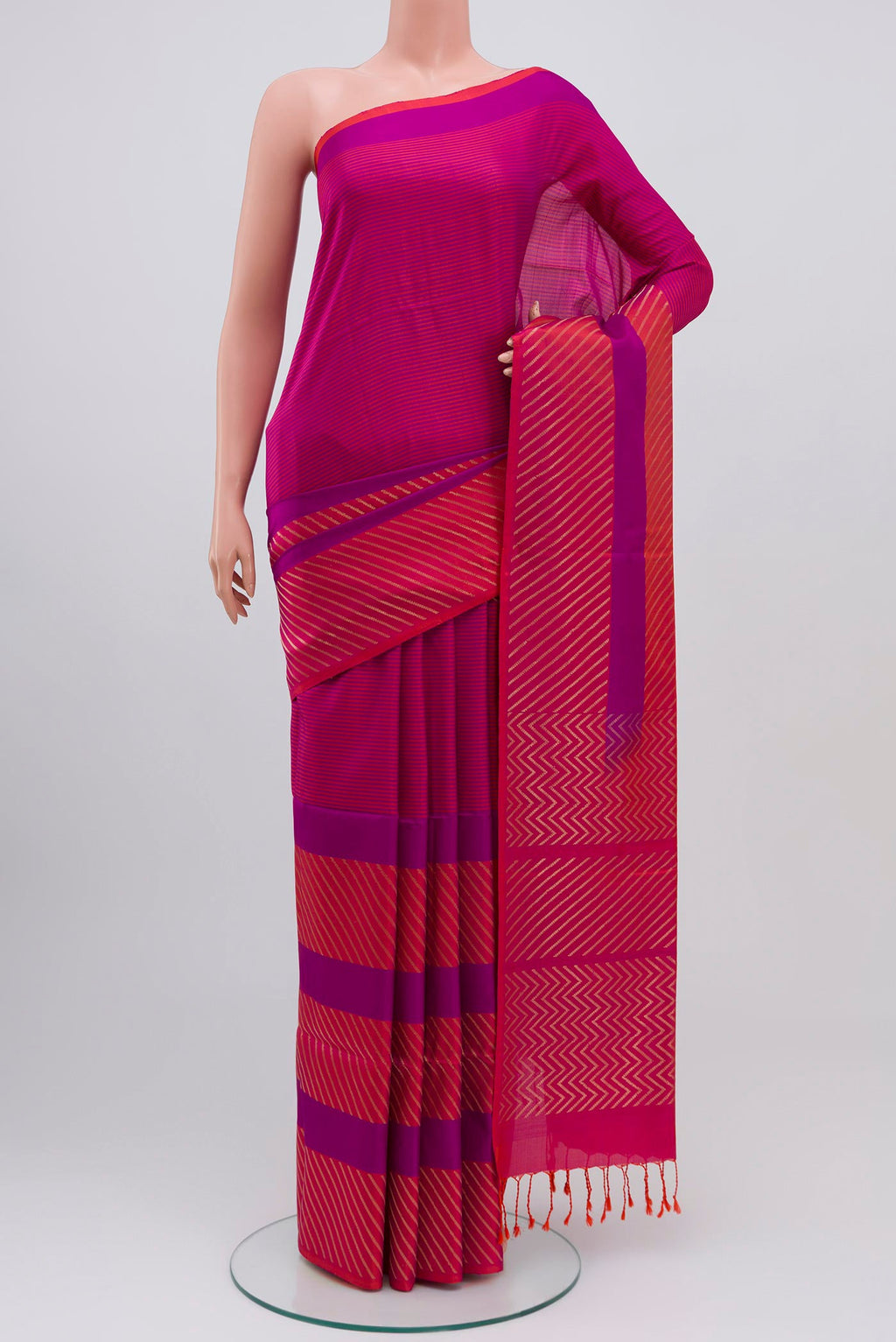 Multi Color Soft Silk Saree with Fancy on the body and Without Border.  displayed on a mannequin