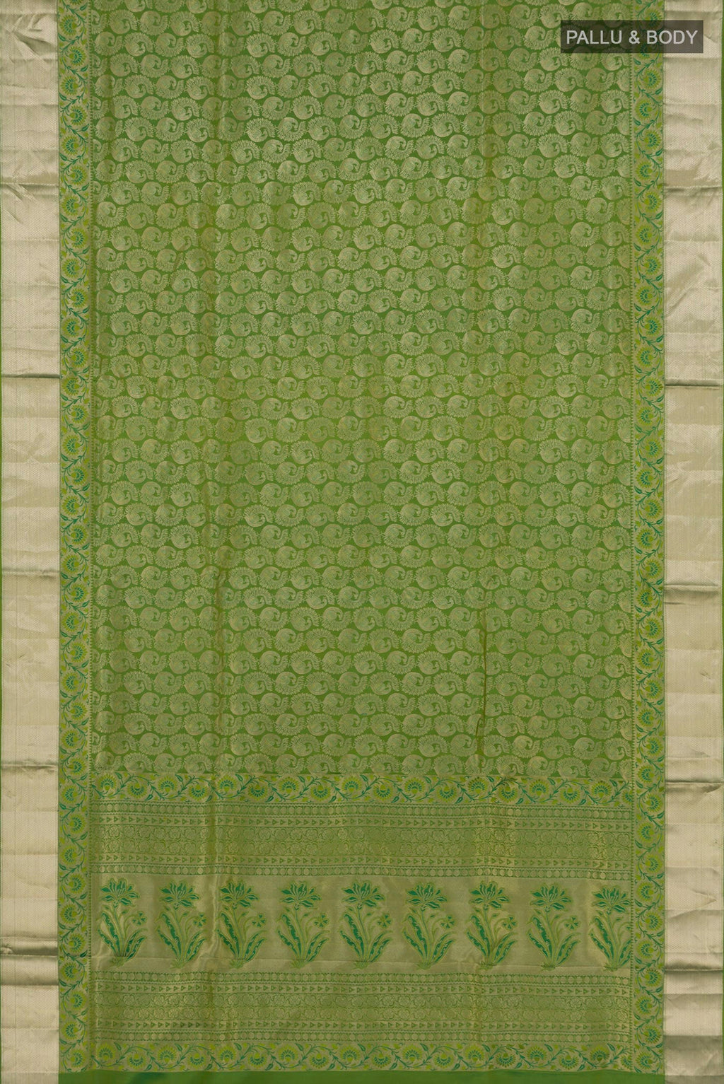 Flat view of Green Soft Silk Saree with Zari Brocade on the body and Zari Border. 