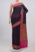 Blue Georgette Saree with Fancy on the body and Zari Border.  displayed on a mannequin