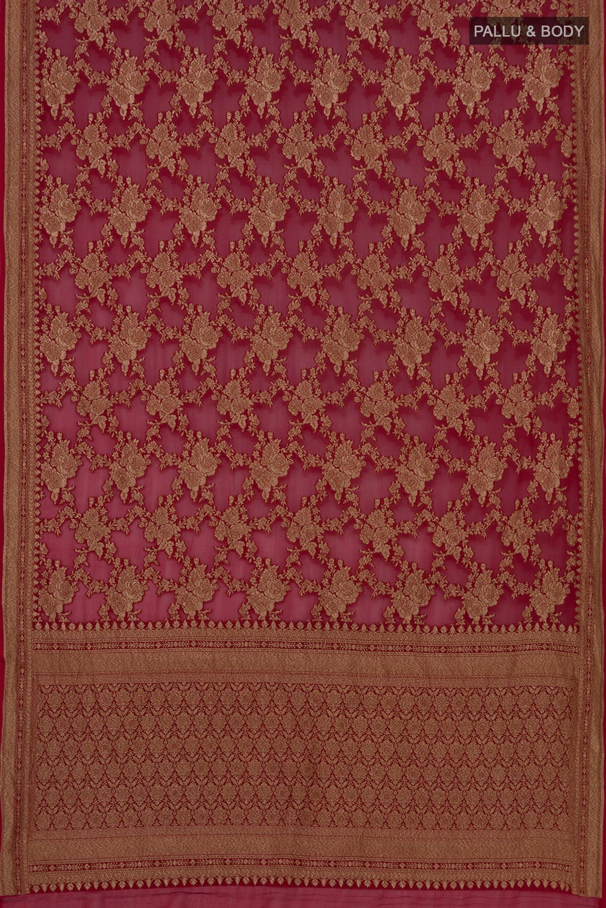 Flat view of Maroon Georgette Saree with Fancy on the body and Zari Border. 