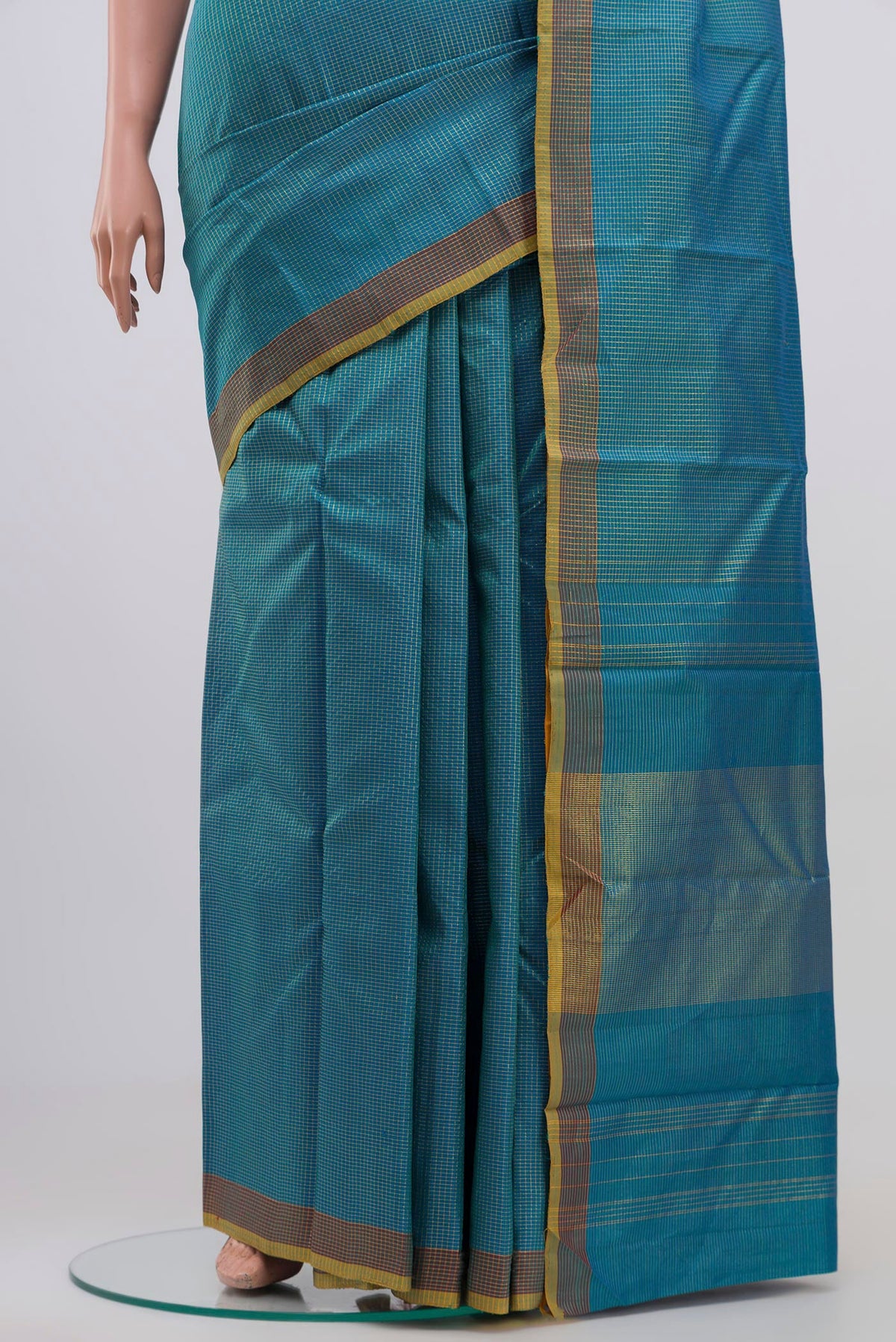 Pleats and pallu of Blue Kanchipuram Silk Saree with Checked design on the body and Zari Border. 