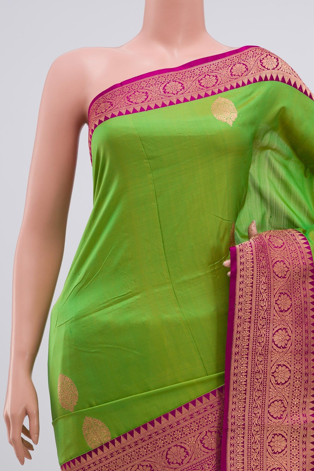 Border image of Parrot Green Banarasi Katan Silk Saree with Zari Butta on the body and Zari Border. 