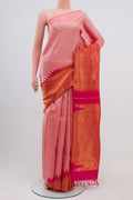 Golden Peach Kanjivaram Silk Saree with Half And Half on the body and Without Border.  displayed on a mannequin