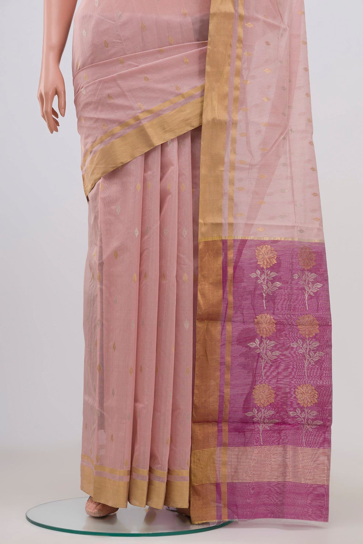 Pleats and pallu of Peach Chanderi Silk Cotton Saree with Zari Butta on the body and Zari Border. 