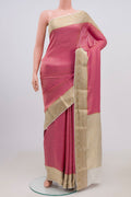 Pink Mysore Crepe Saree with Zari Brocade on the body and Zari Border.  displayed on a mannequin