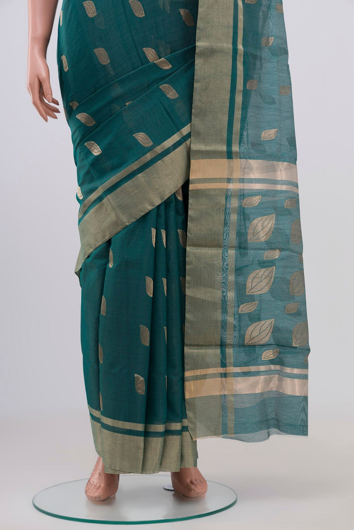 Pleats and pallu of Green Chanderi Silk Cotton Saree with Zari Butta on the body and Zari Border. 