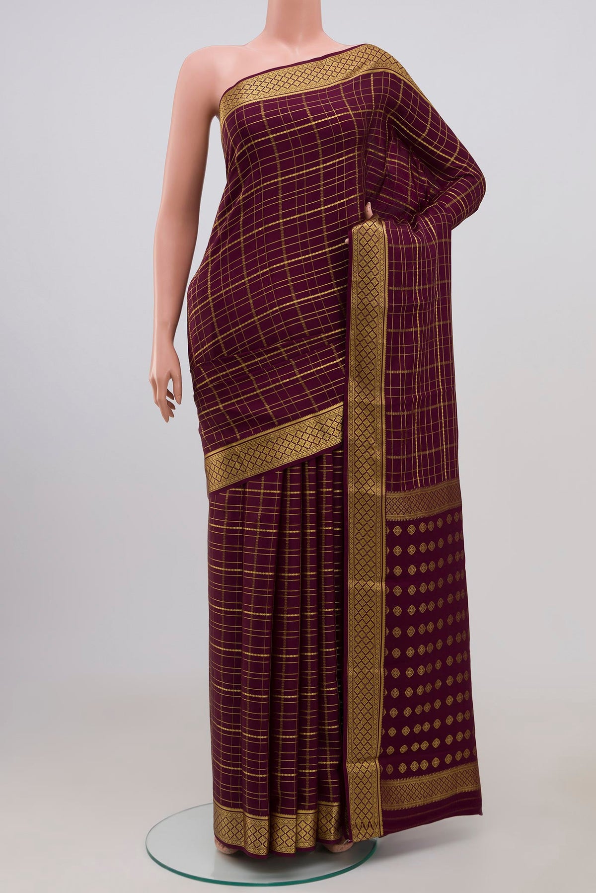 Purple Mysore Crepe Saree with Checked design on the body and Zari Border.  displayed on a mannequin