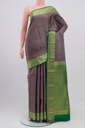 Grey Kanchipuram Saree with Stripes on the body and Zari Border.  displayed on a mannequin