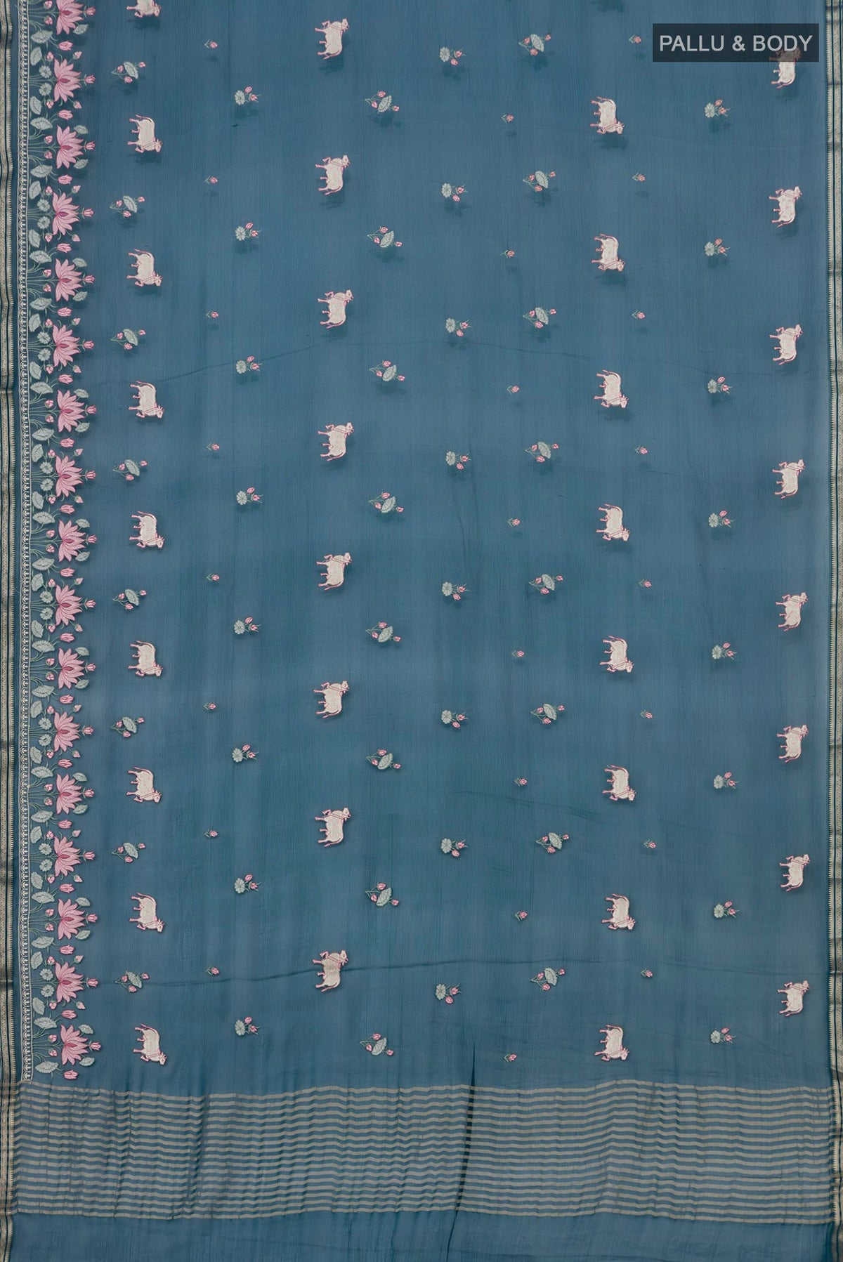 Flat view of Blue Chiffon Saree with Embroidery on the body and Fancy Border. 