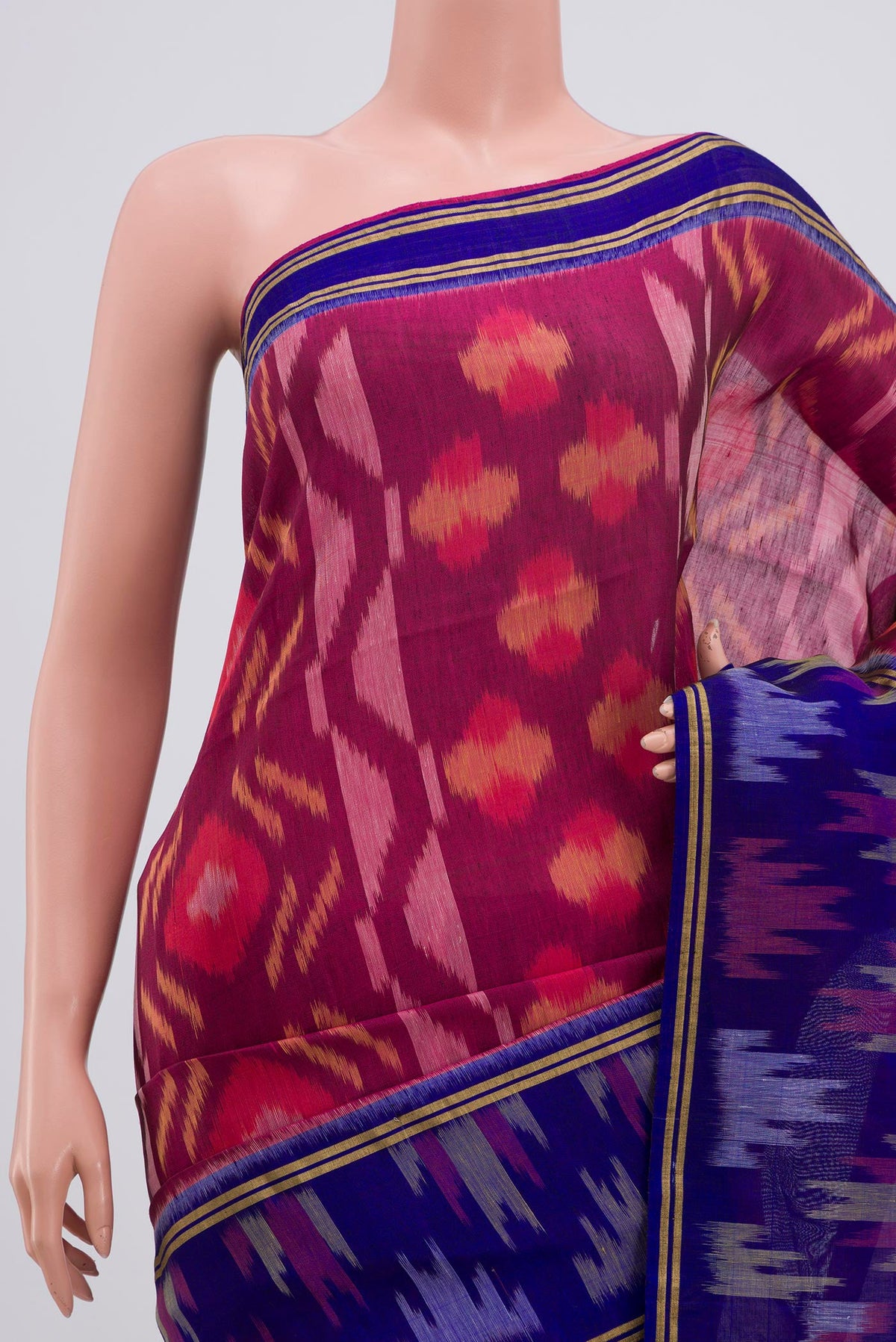Border image of Purple Soft Silk Saree with Ikat Print on the body and Ikat Border. 