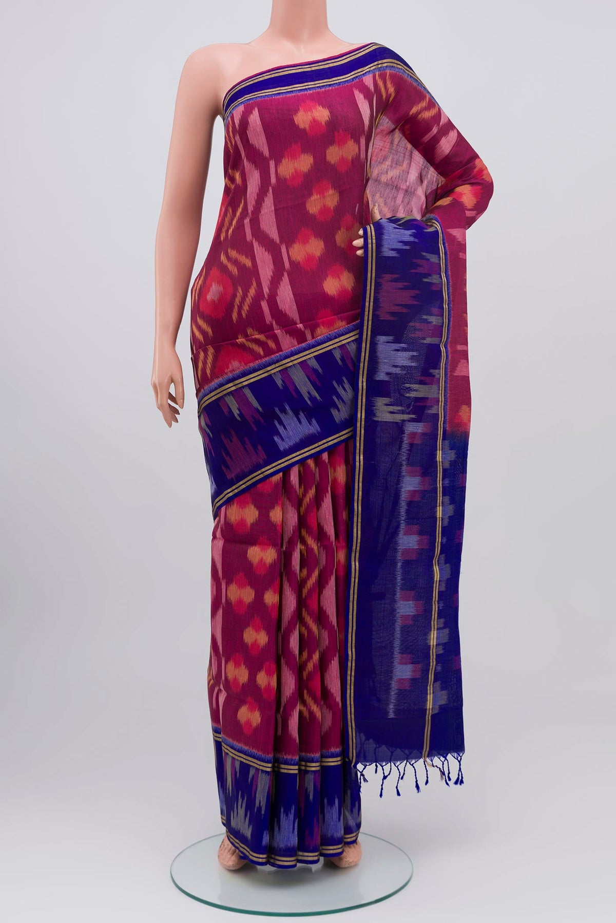 Purple Soft Silk Saree with Ikat Print on the body and Ikat Border.  displayed on a mannequin