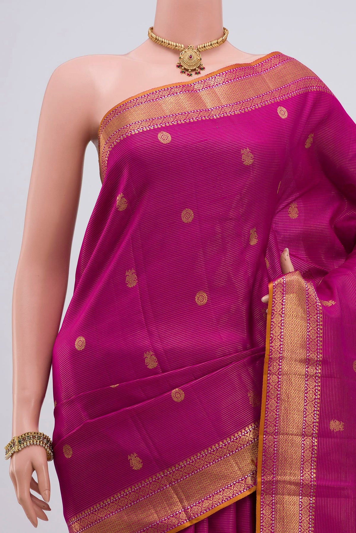 Border image of Magenta Kanjivaram Silk Saree with Zari Butta on the body and Zari Border. 