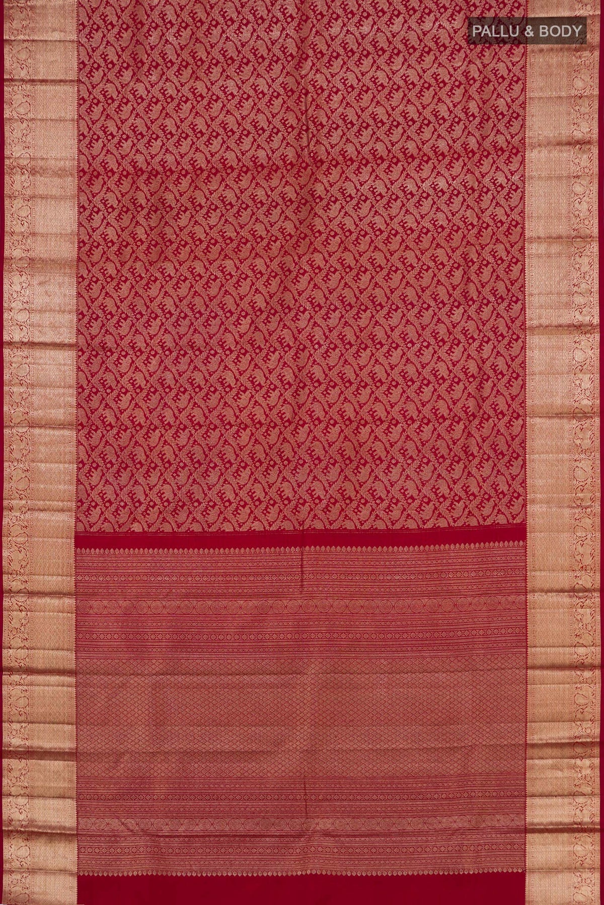 Flat view of Maroon Kanchipuram Silk Saree with Zari Brocade on the body and Zari Border. 
