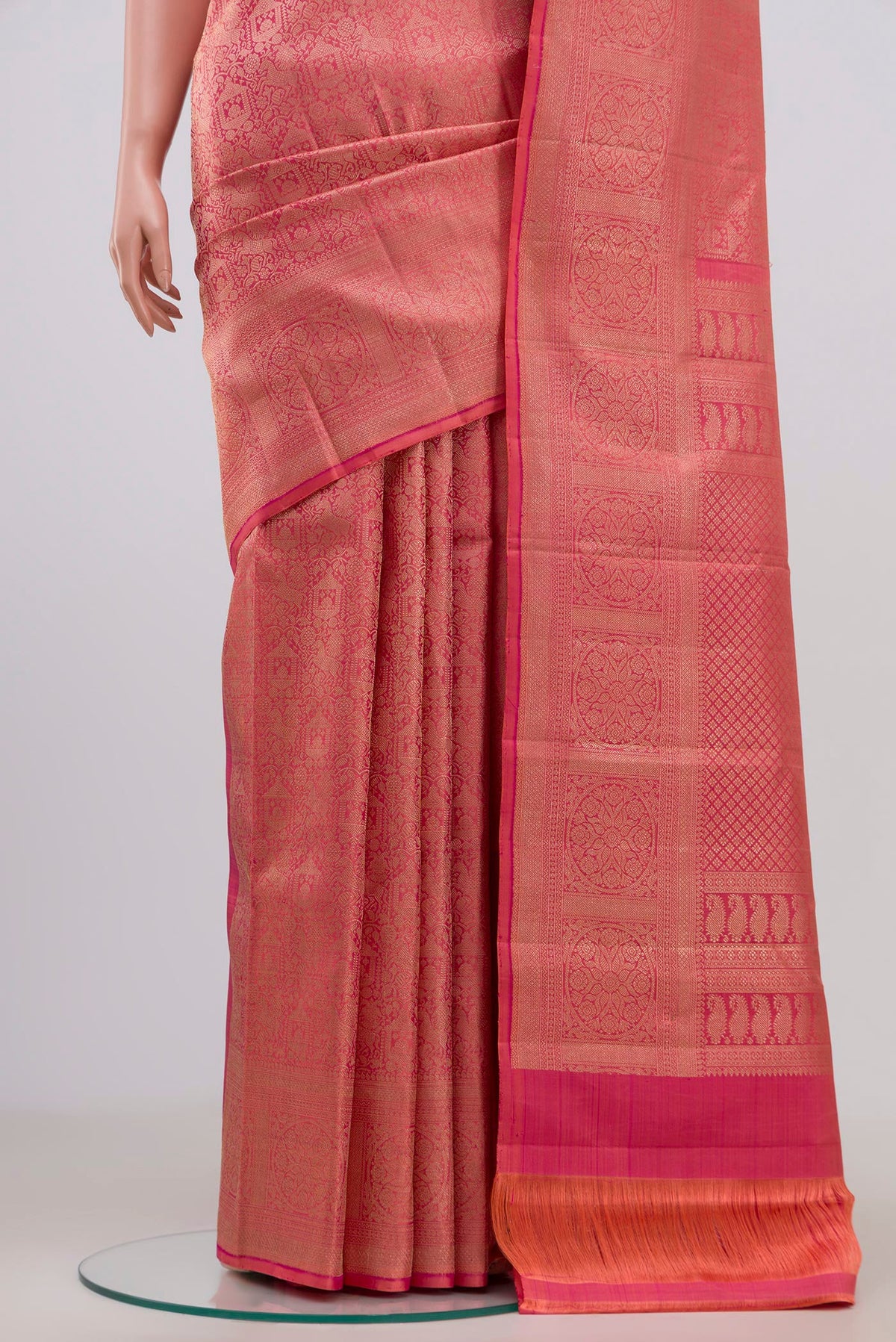 Pleats and pallu of Pink Kanchipuram Saree with Zari Brocade on the body and Zari Border. 