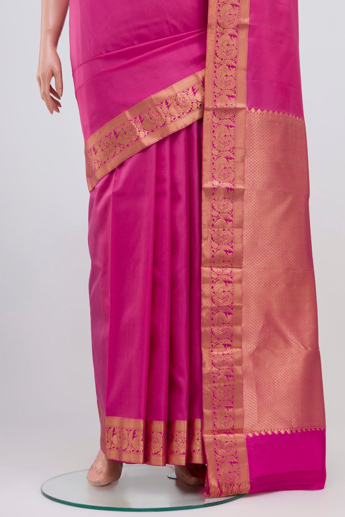 Pleats and pallu of Pink Kanjivaram Saree with Plain Body and Zari Border. 