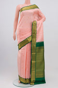 Pink Kanjivaram Saree with Zari Butta on the body and Zari Border.  displayed on a mannequin