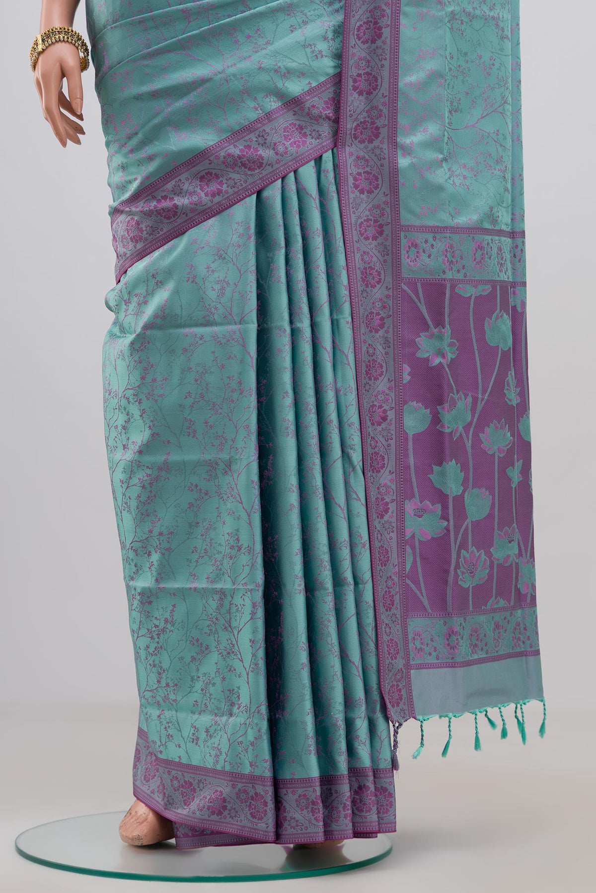 Pleats and pallu of Blue Soft Silk Saree with Jacquard design on the body and Thread Border. 