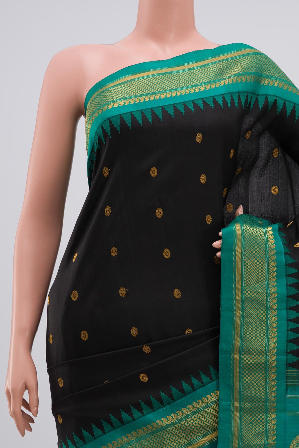 Border image of Black Gadwal Silk Saree with Zari Butta on the body and Zari Border. 