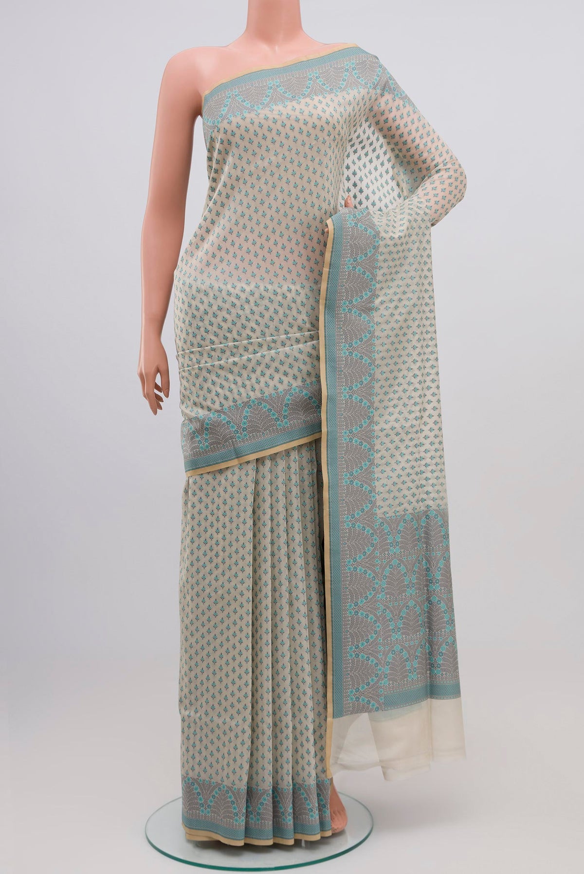 White Banarasi Silk Saree with Thread Butta on the body and Thread Border.  displayed on a mannequin