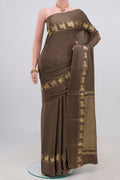 Grey Crepe Saree with Plain Body and Fancy Border.  displayed on a mannequin