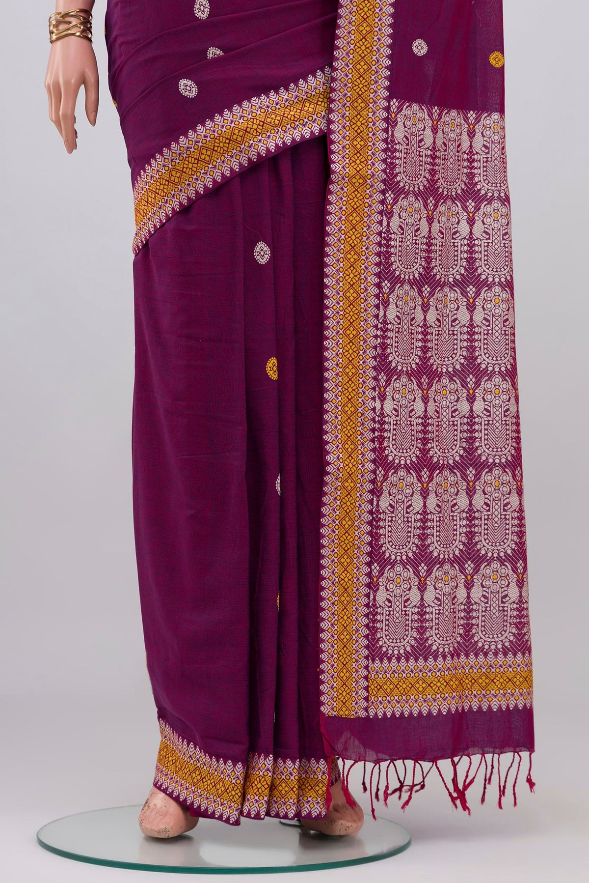 Pleats and pallu of Purple Assam Cotton Saree with Thread Butta on the body and Thread Border. 