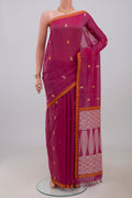 Pink Assam Cotton Saree with Thread Butta on the body and Thread Border.  displayed on a mannequin